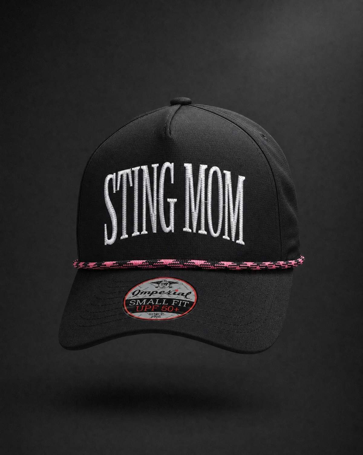 Black cap with 'STING MOM' text on a dark background